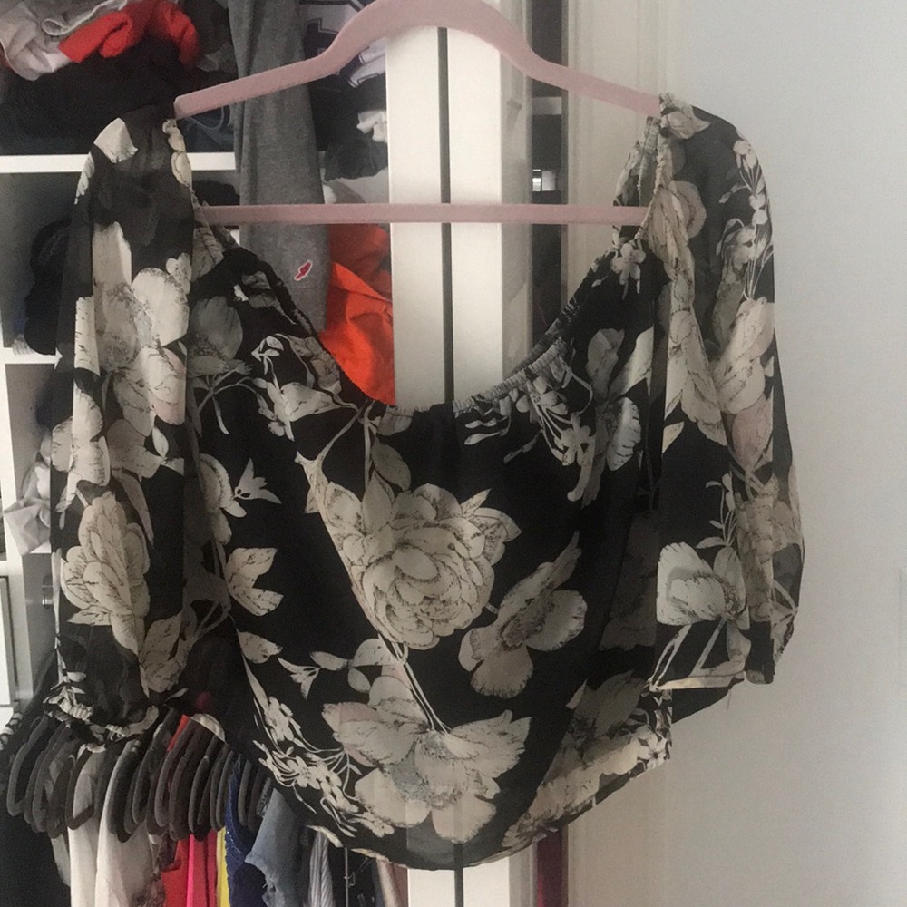 Black off the shoulder shirt with flowers